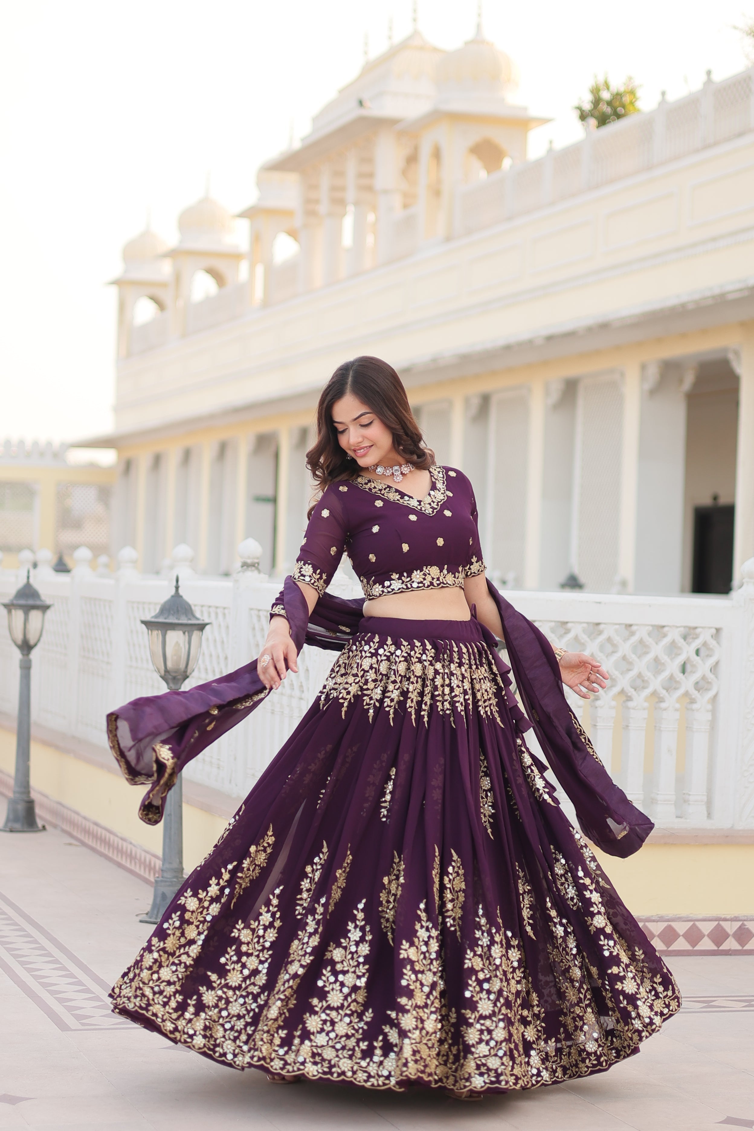 Embroidered Wine Fully Flaired Georgette Lehenga Set