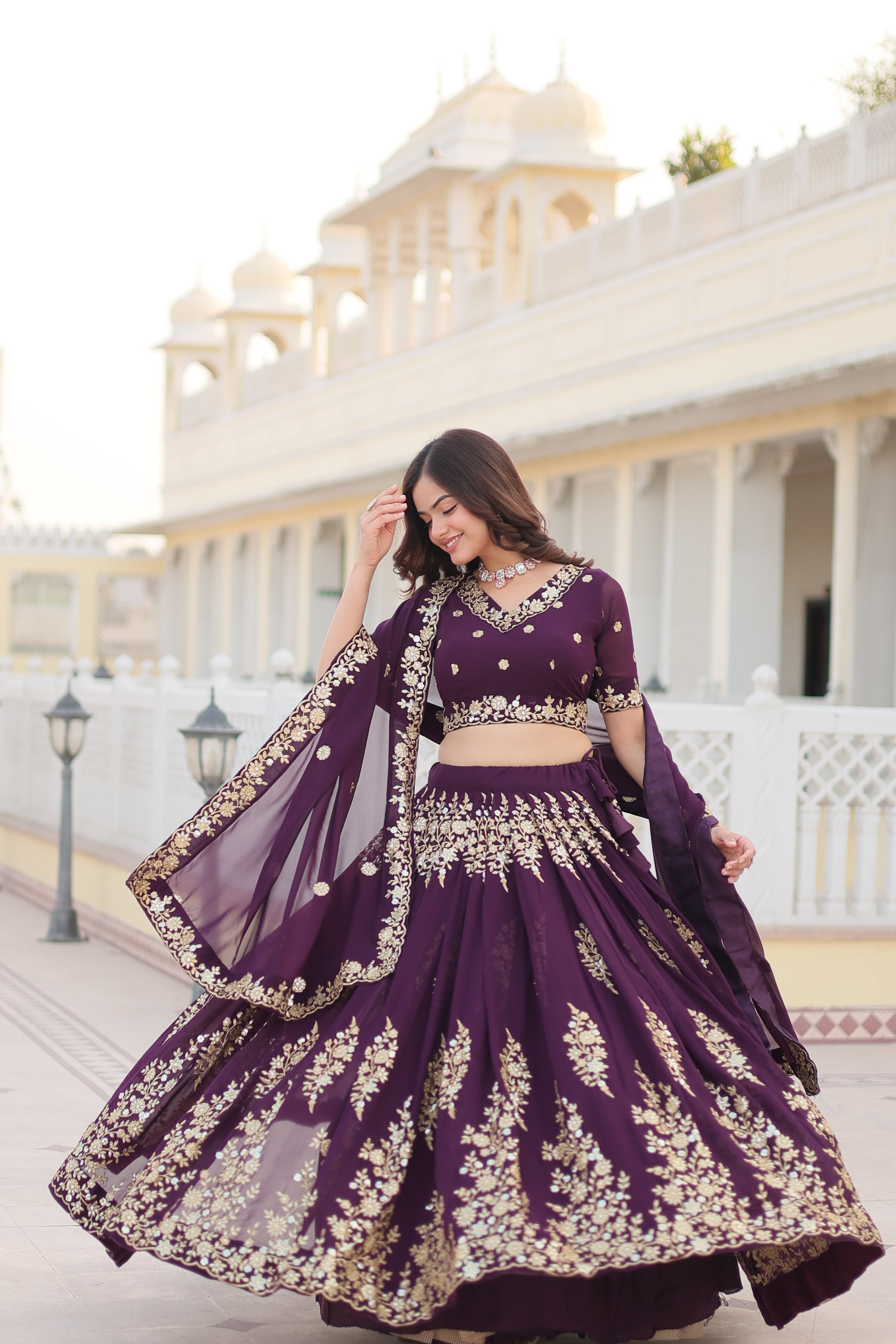 Embroidered Wine Fully Flaired Georgette Lehenga Set